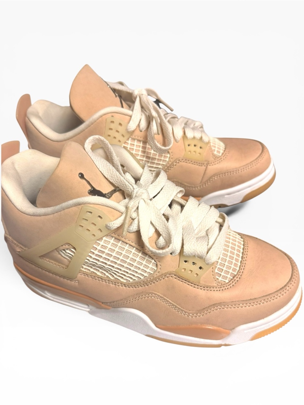 Nike Air Jordan 4 Retro 'Shimmer' women's‎ sneakers featuring a tan leather